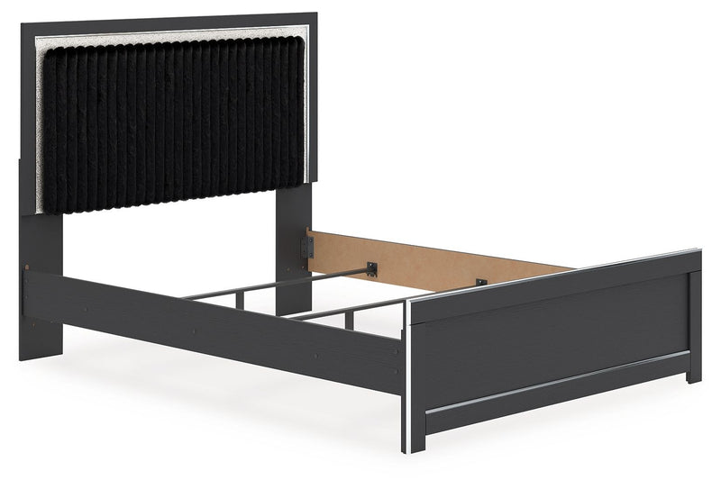 Upholstered panel bed with black fabric headboard and dark frame, rectangular side rails