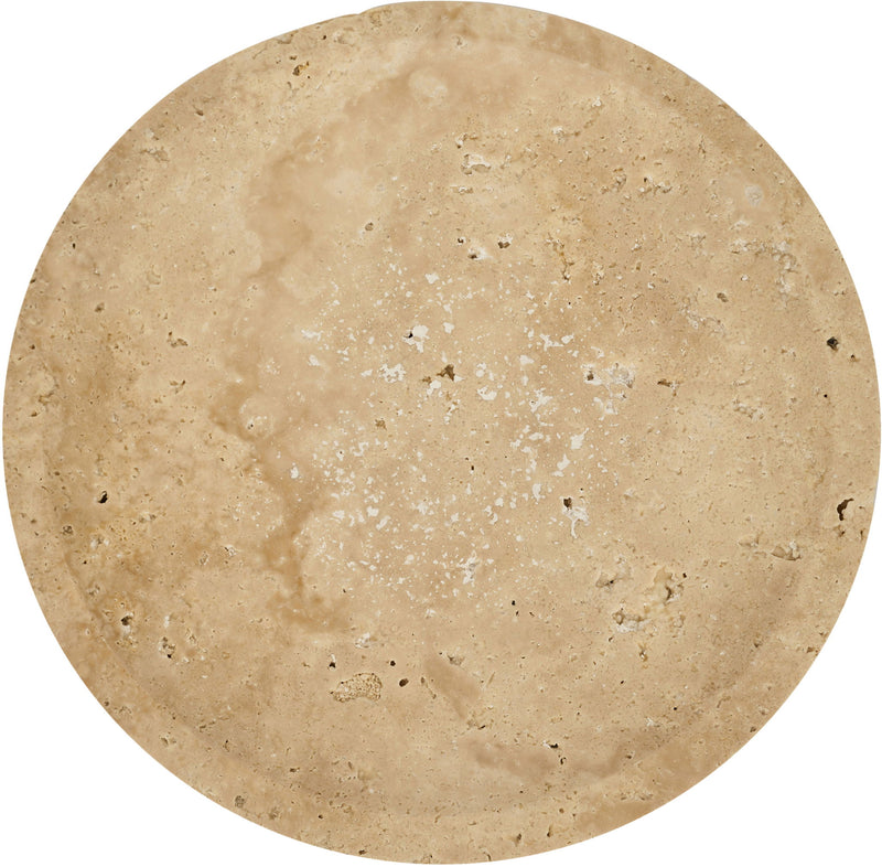 Beige travertine bowl top view with speckled stone texture