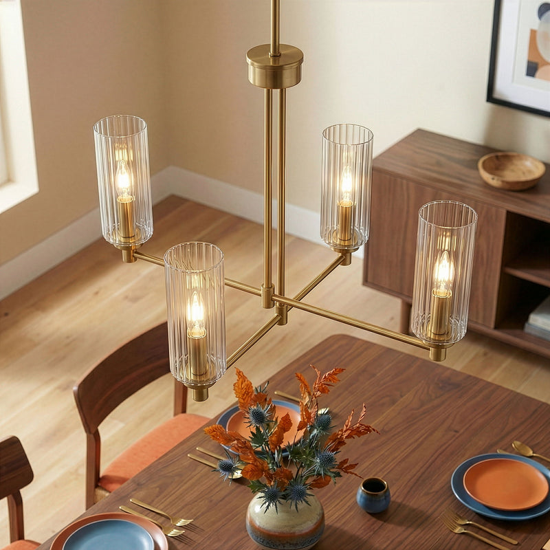 Antique brass 4-light chandelier with clear ribbed glass shades and visible bulbs