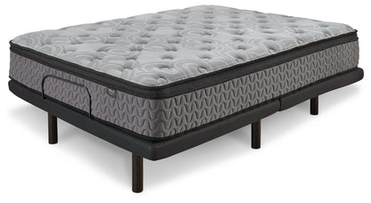 Gray firm mattress with quilted top and textured side, black edge frame