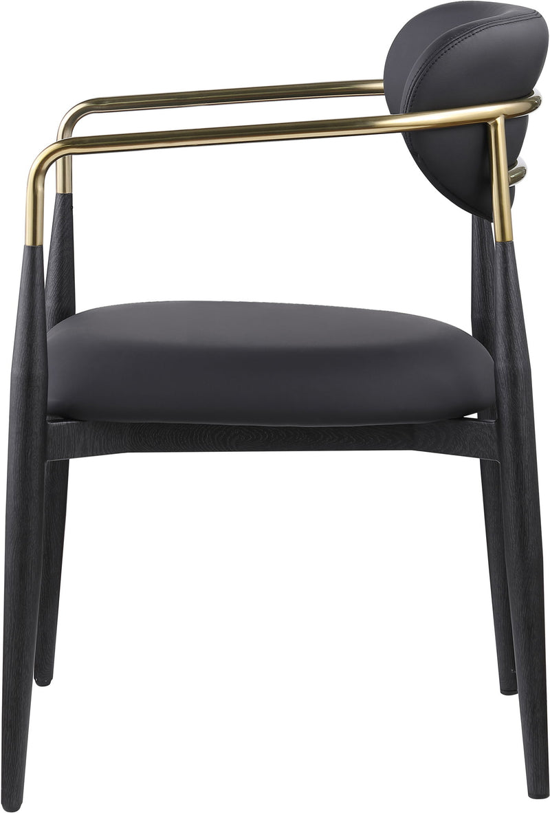 Black upholstered dining arm chair with rounded back, black legs, gold arm frame