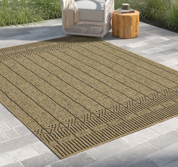 Light brown jute area rug angled view with ribbed stripes and geometric border