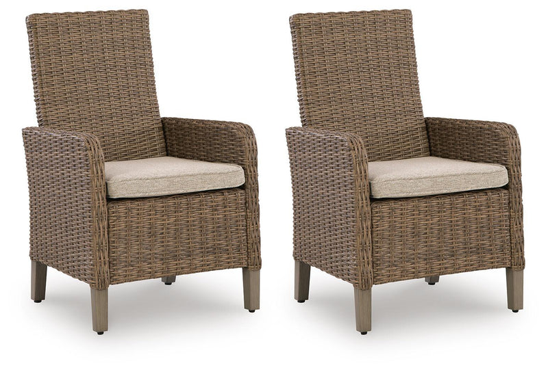 Set of 2 beige woven arm chairs with light cushions and tall backs