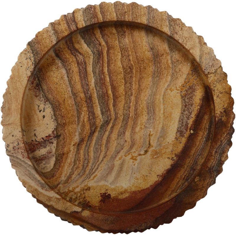 Sandstone round tray with sand interior, dark veining, and scalloped outer edge