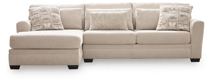 Beige 2-piece sectional sofa with corner chaise, three seat-back pillows and back cushions