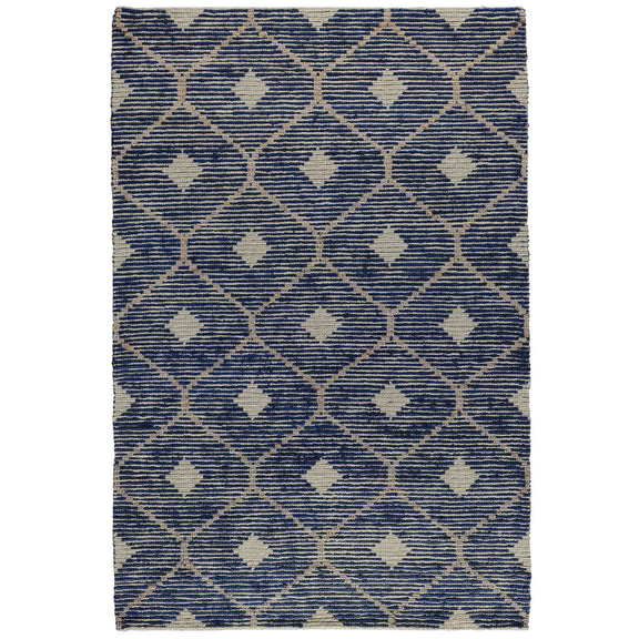 Indigo blue diamond-pattern area rug with repeating small motif details.