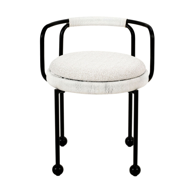Cream upholstered round seat outdoor dining chair with black tubular back and pedestal-style legs