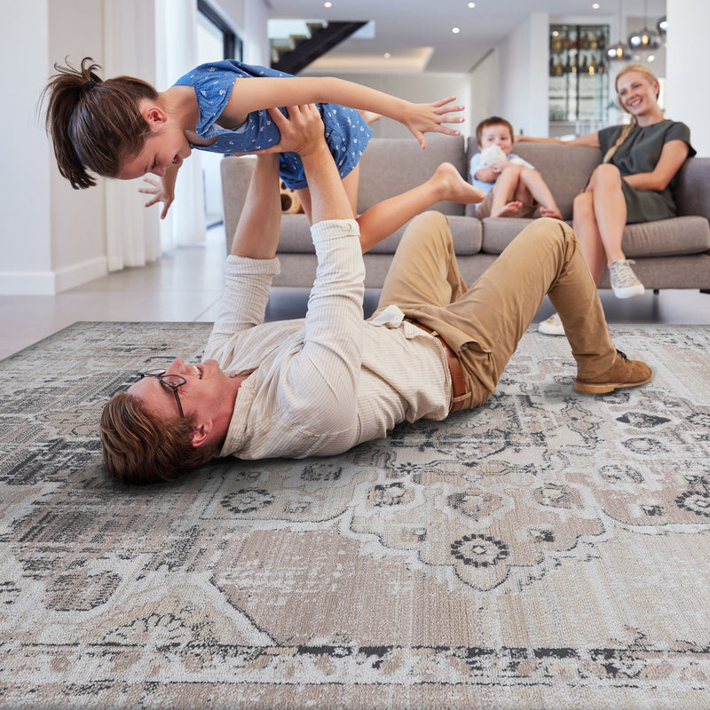 Medallion area rug with distressed geometric pattern in beige and blue