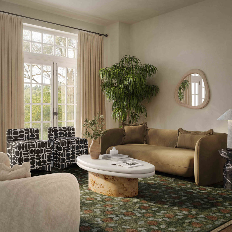 Light brown fabric loveseat with two back pillows and curved armrests