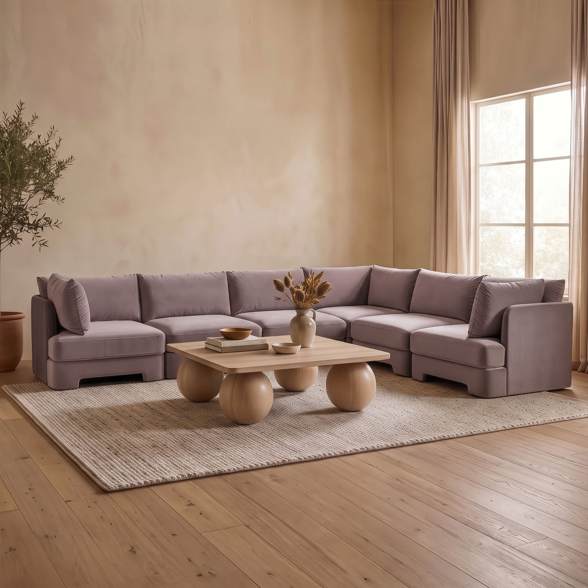 Light gray velvet corner sectional sofa with chaise seats, square arms, and cushions