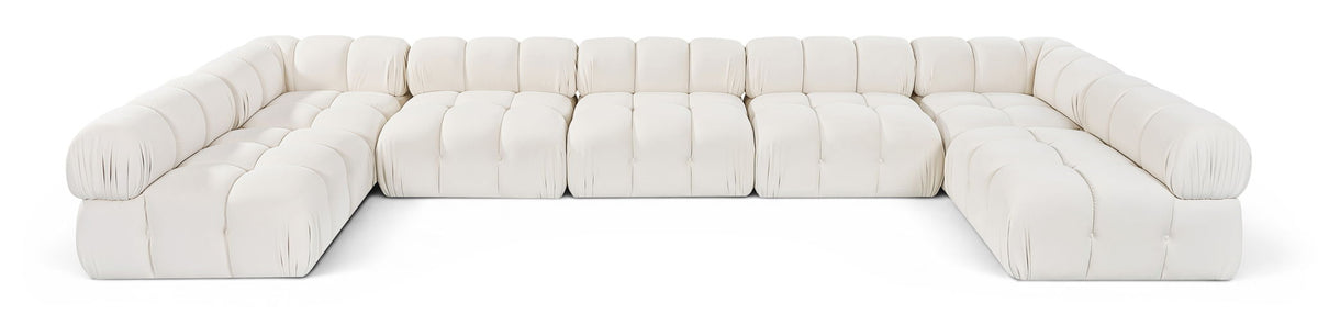 White U-shaped modular sectional sofa with cushioned seat and rounded armrests