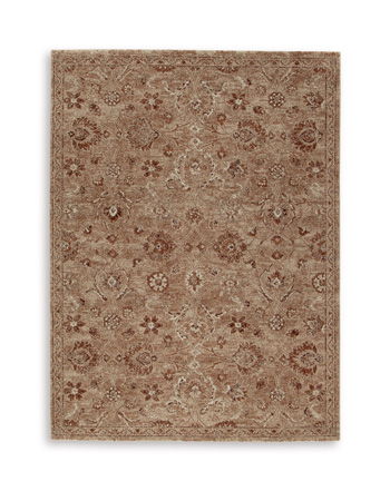Light brown area rug featuring dense ornamental floral pattern throughout