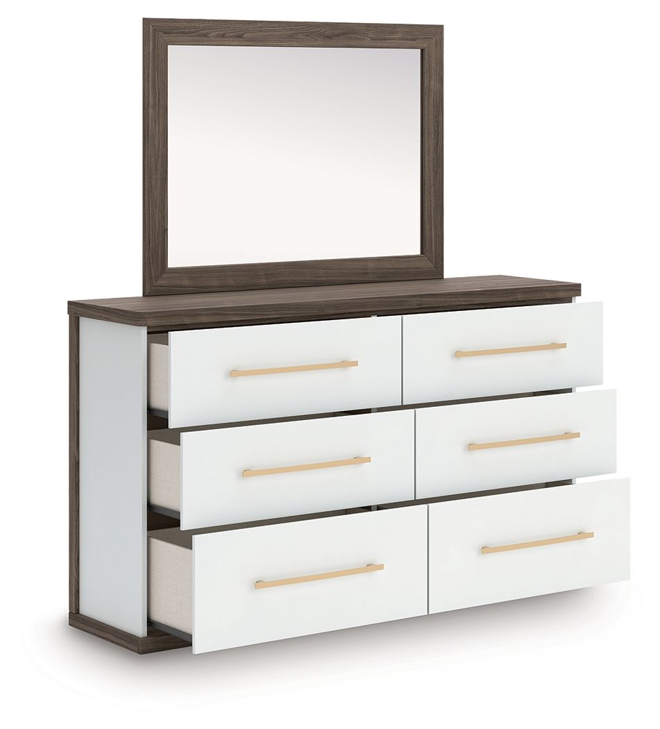 Dresser with mirror and white drawers, dark frame, brushed gold bar handles