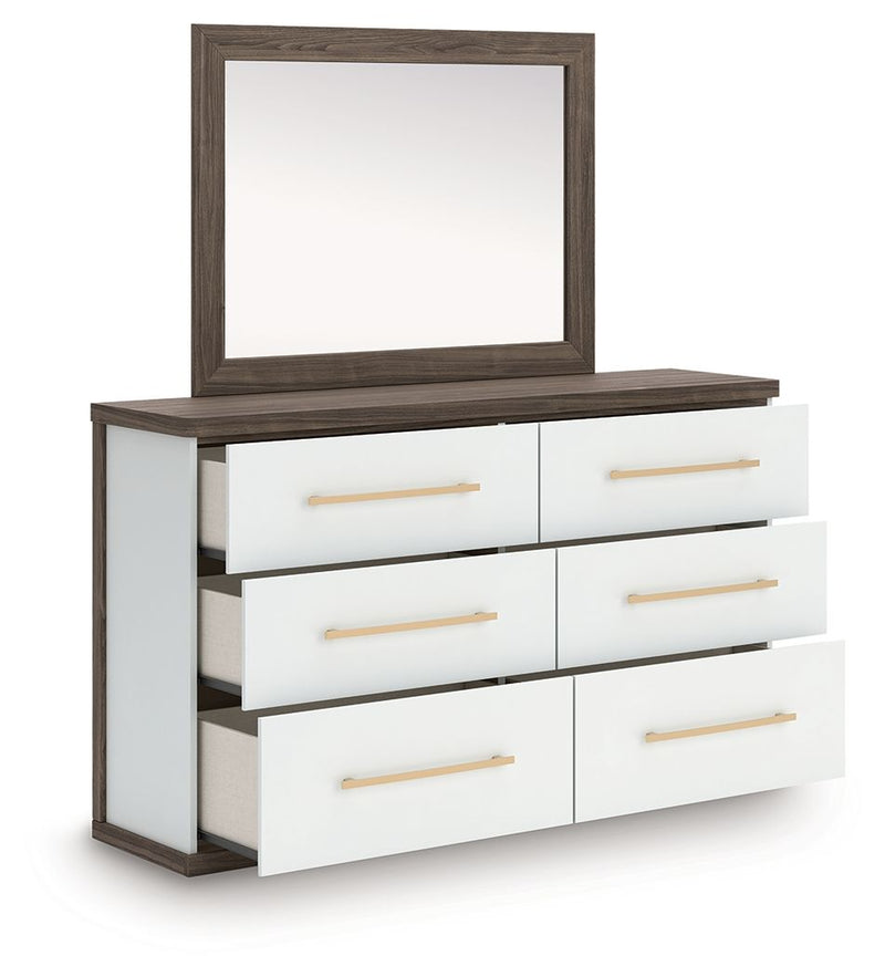 Dresser with mirror and white drawers, dark frame, brushed gold bar handles