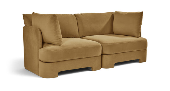 Light brown velvet upholstered 2-piece loveseat with two seat sections and bolster pillows