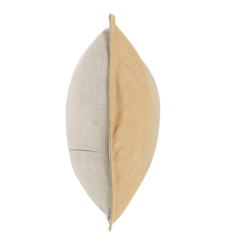 Beige and tan accent pillow with contrast piping along edge seam