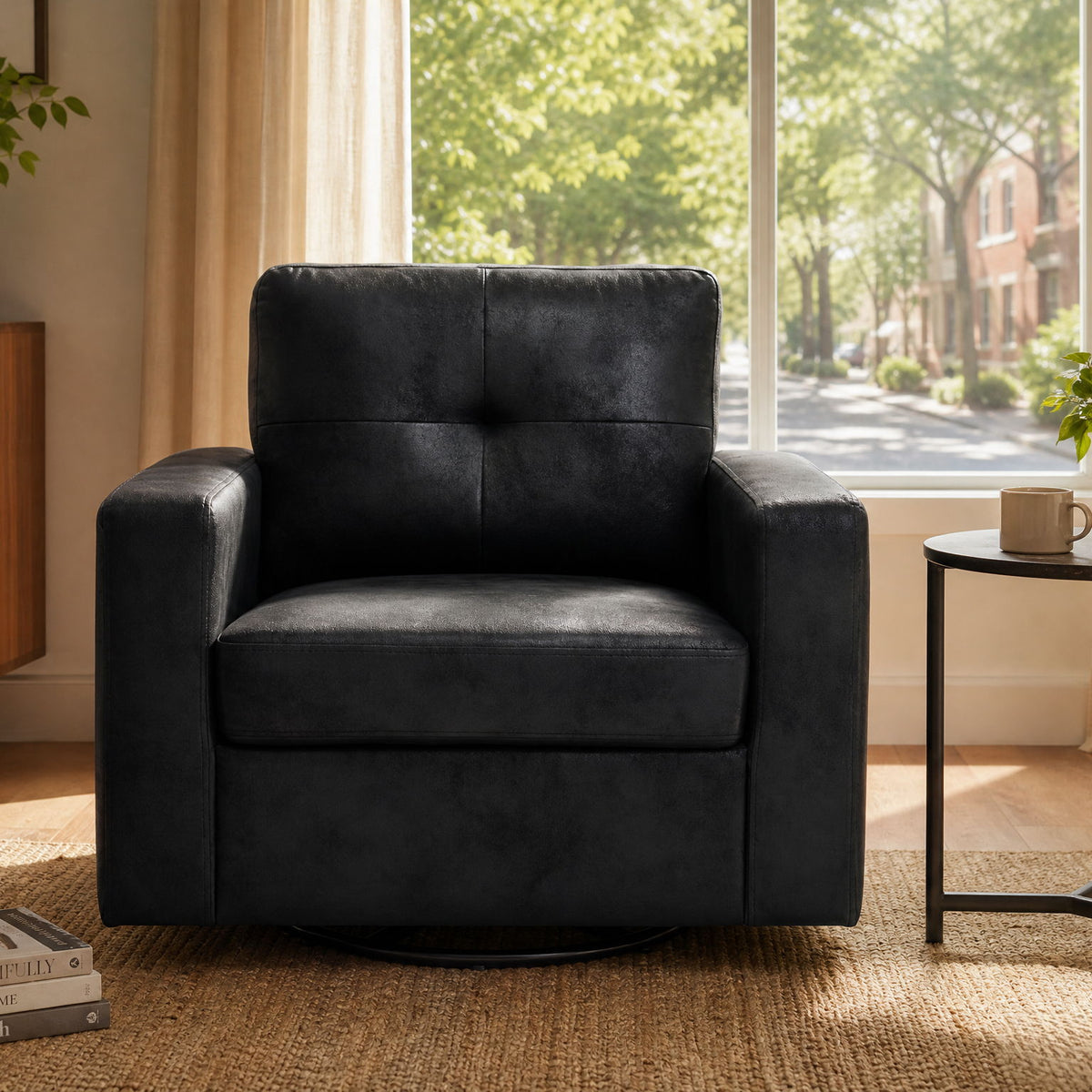 Black single lounge chair with padded armrests and flat seat cushion