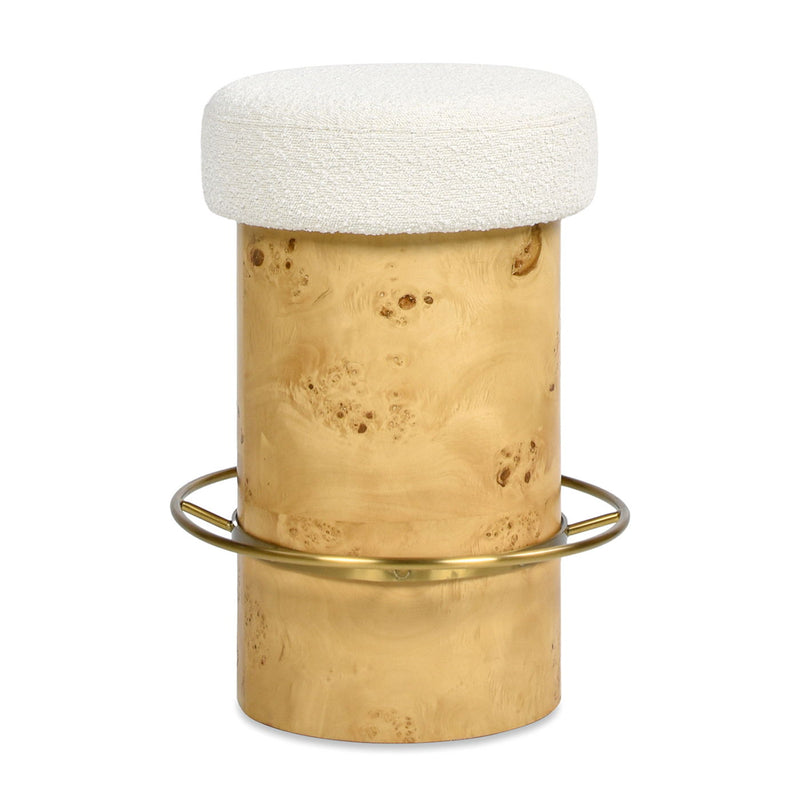 Ivory round upholstered counter stool with burl-style cylindrical base and metal ring