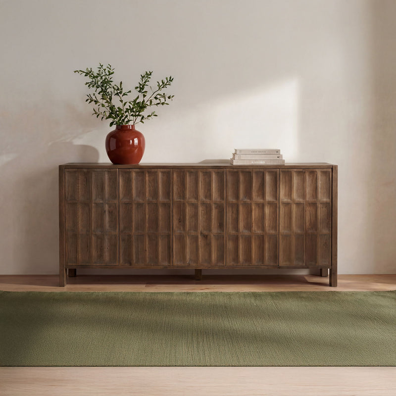 Brown sideboard cabinet with paneled doors, tapered legs, and shelf top