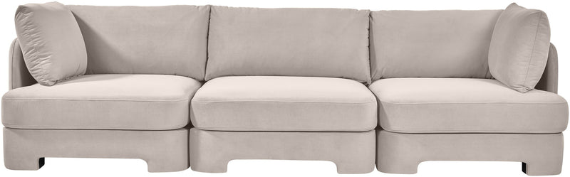 Light gray velvet 3-piece sofa with three seat cushions and firm arm bolsters