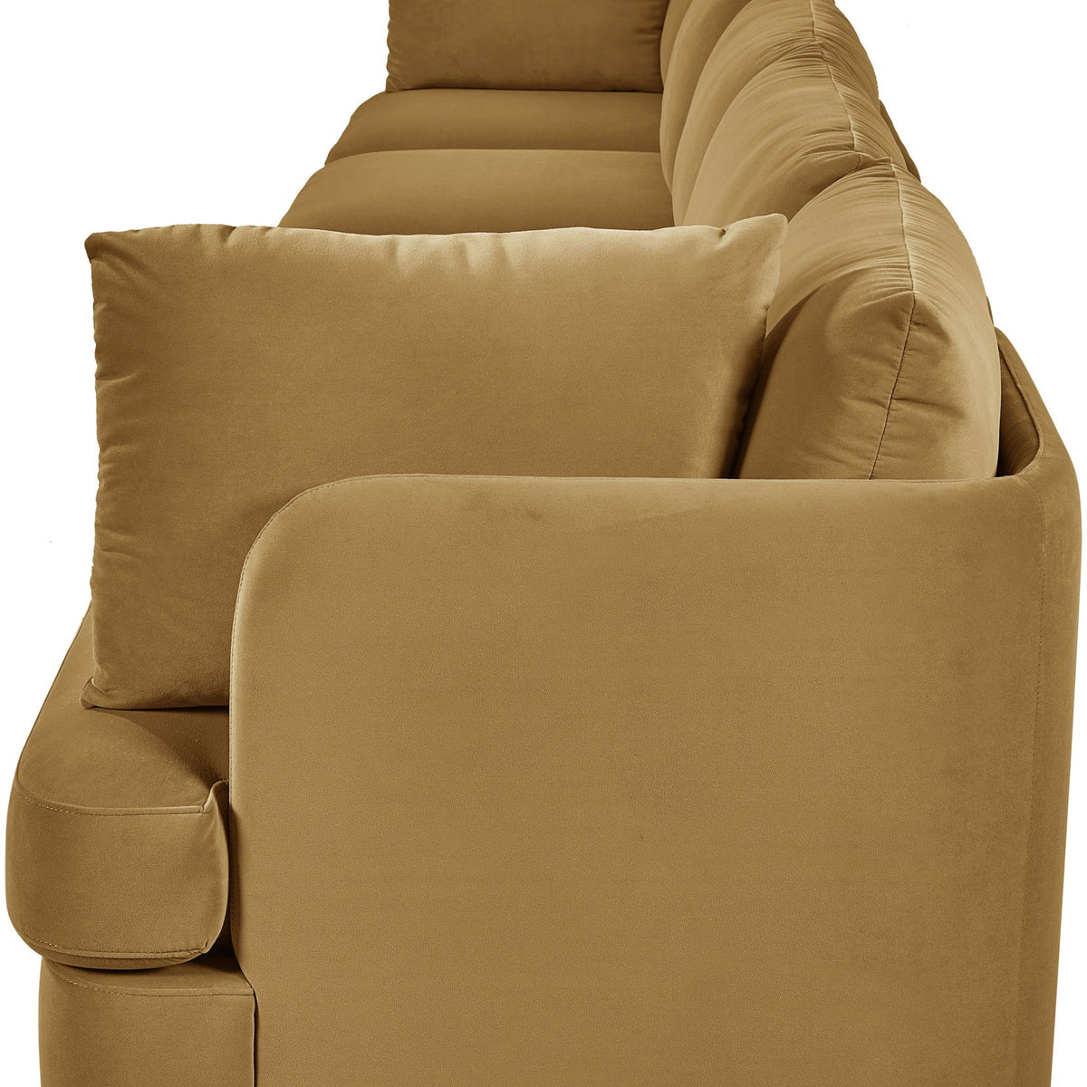 Tan velvet upholstered accent sofa chair with rounded arms and stacked back cushions