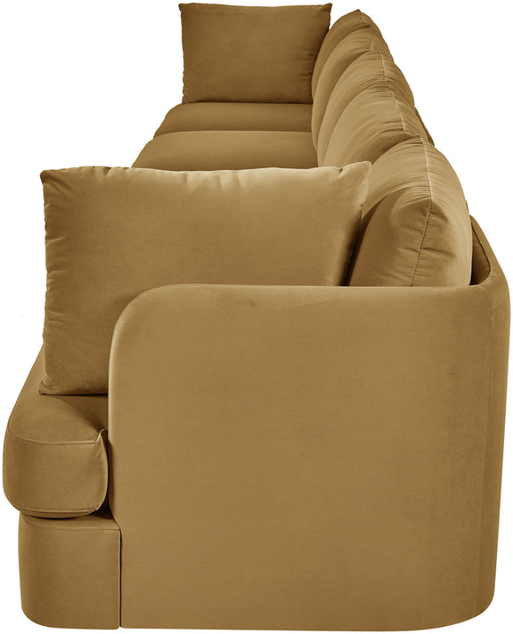 Tan velvet upholstered accent sofa chair with rounded arms and stacked back cushions