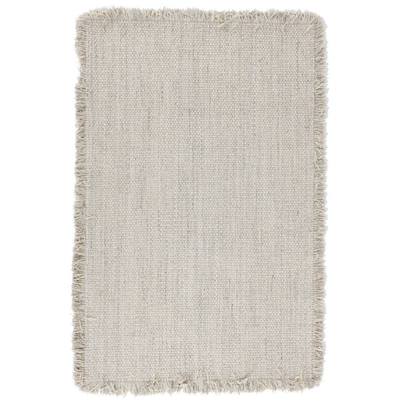 Bradbury wool rug in ivory with short shag pile and fringed edges