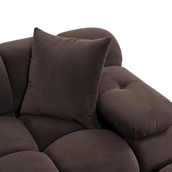 Dark brown modular sofa corner with plush seat and large square accent pillow