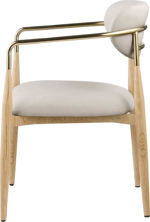 Vegan leather dining arm chair with light gray/cream upholstery, gold-tone arms, wood legs