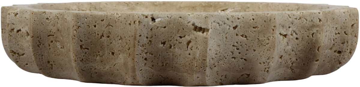 Beige travertine bowl side view with rounded low profile and speckled surface.