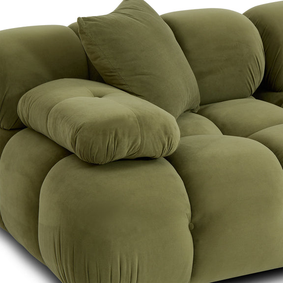 Green modular sectional sofa close-up of plush seat and cushion back