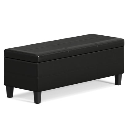 Black storage ottoman bench with padded top and tapered legs