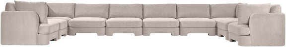 Light gray velvet sectional sofa with modular seats and corner section