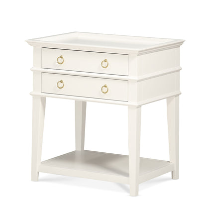 White nightstand with tray top, two drawers, brass-tone ring pulls, open lower shelf