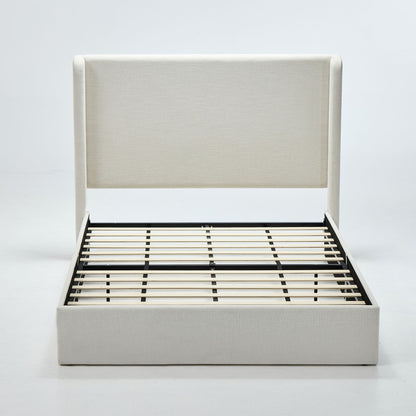 Beige upholstered wingback bed frame with tall headboard and slatted base