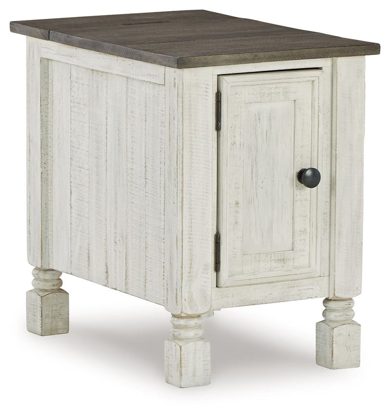 Chair side end table with dark top, white distressed cabinet, hinged door with round black knob