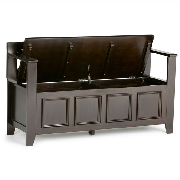 Brown entryway storage bench with flip-open top and paneled cabinet front