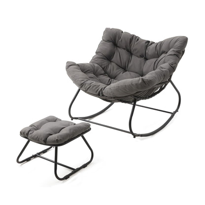 Dark gray egg-style rocking chair with cushioned ottoman and black metal base