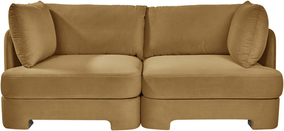Mustard beige velvet upholstered loveseat with rounded arms and back cushions