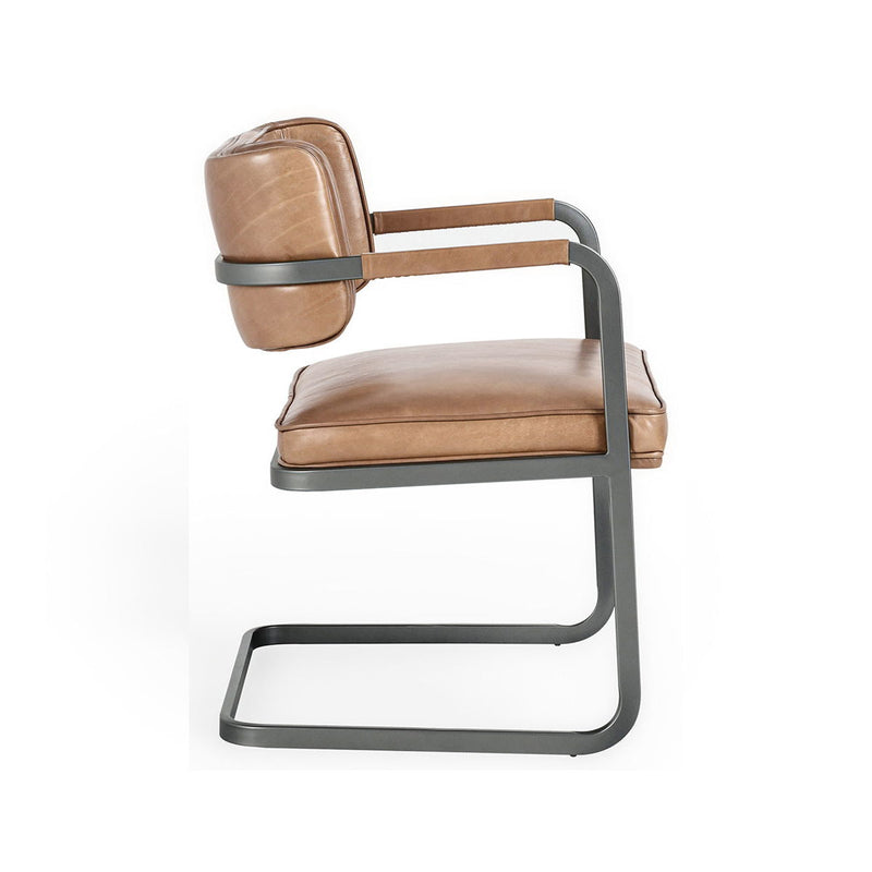 Tan dining chair with padded seat and back, and gray metal cantilever frame