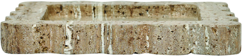 Natalie travertine tray edge view; speckled stone with scalloped sides and layered cut.