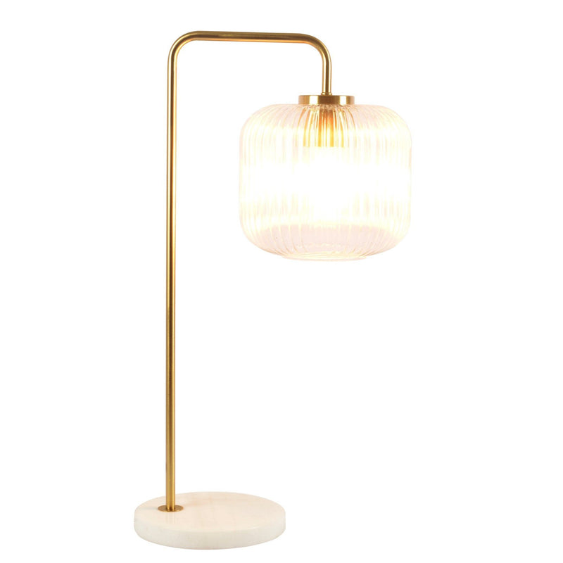 Gold table lamp with clear ribbed glass globe shade and round white marble base