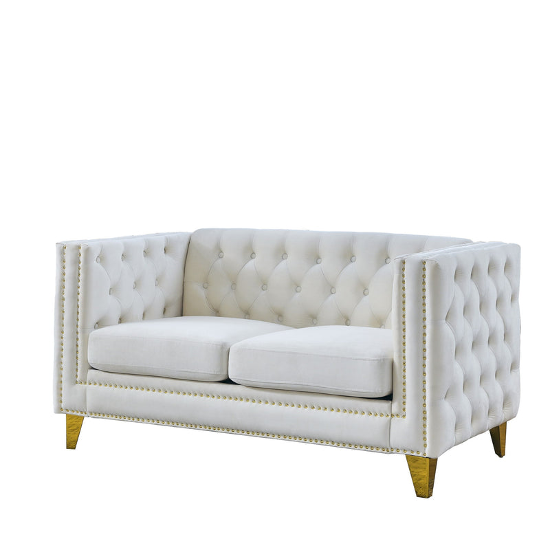 White button-tufted loveseat with dual cushion seats, studded trim, and gold legs