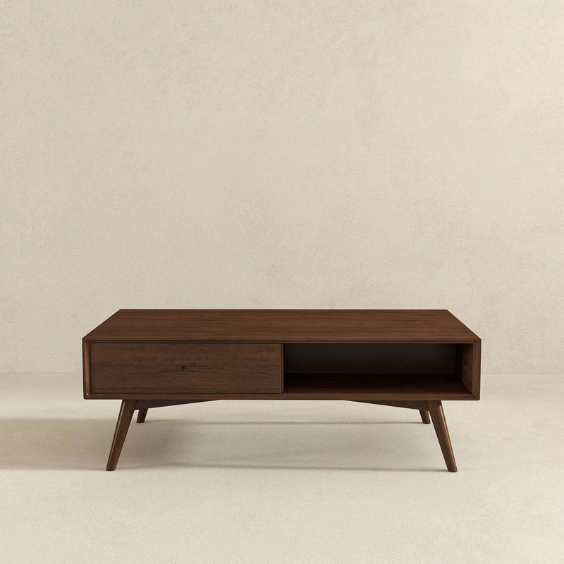 Walnut brown coffee table with a front drawer, open shelf, and tapered legs
