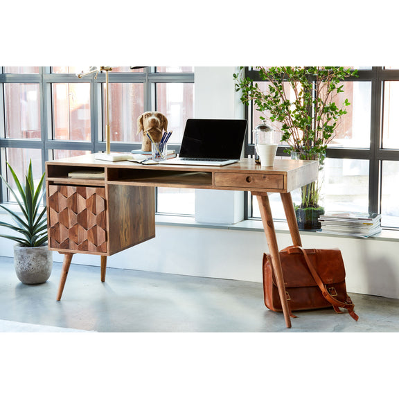 Caramel brown mid-century style desk with drawers, carved cabinet panels, and angled legs