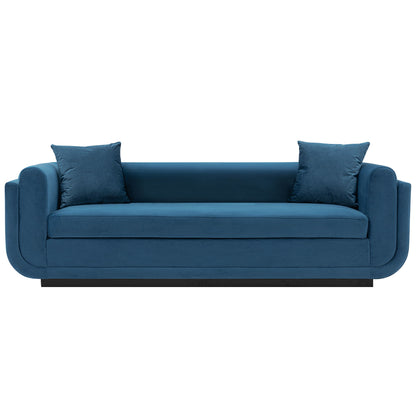 Blue upholstered sofa with two square throw pillows and rounded arms