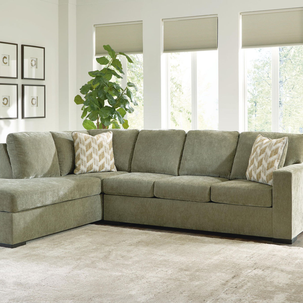 Bridgepoint sectional sofa with corner chaise, light gray fabric and patterned accent pillows