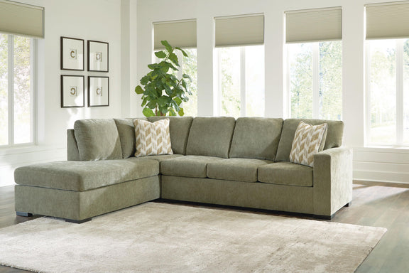 Bridgepoint sectional sofa with corner chaise, light gray fabric and patterned accent pillows