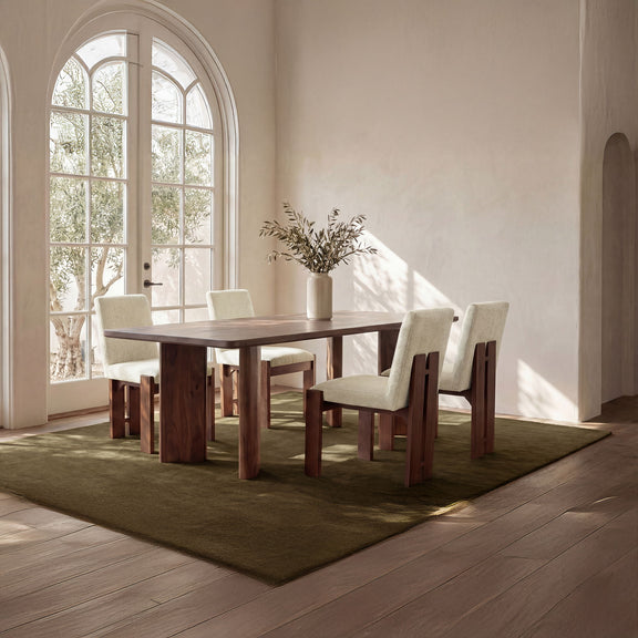Beige upholstered dining chairs with dark brown wooden frames and legs