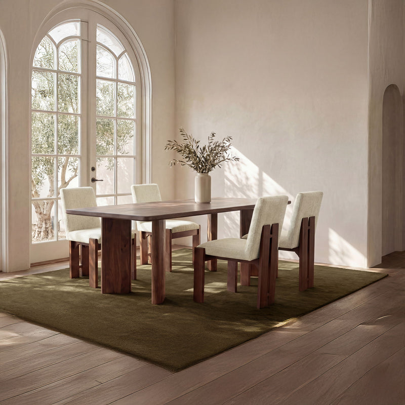 Beige upholstered dining chairs with dark brown wooden frames and legs